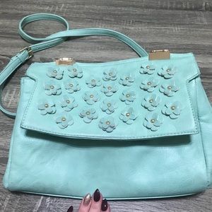 Sea foam green ModCloth purse with flower detail